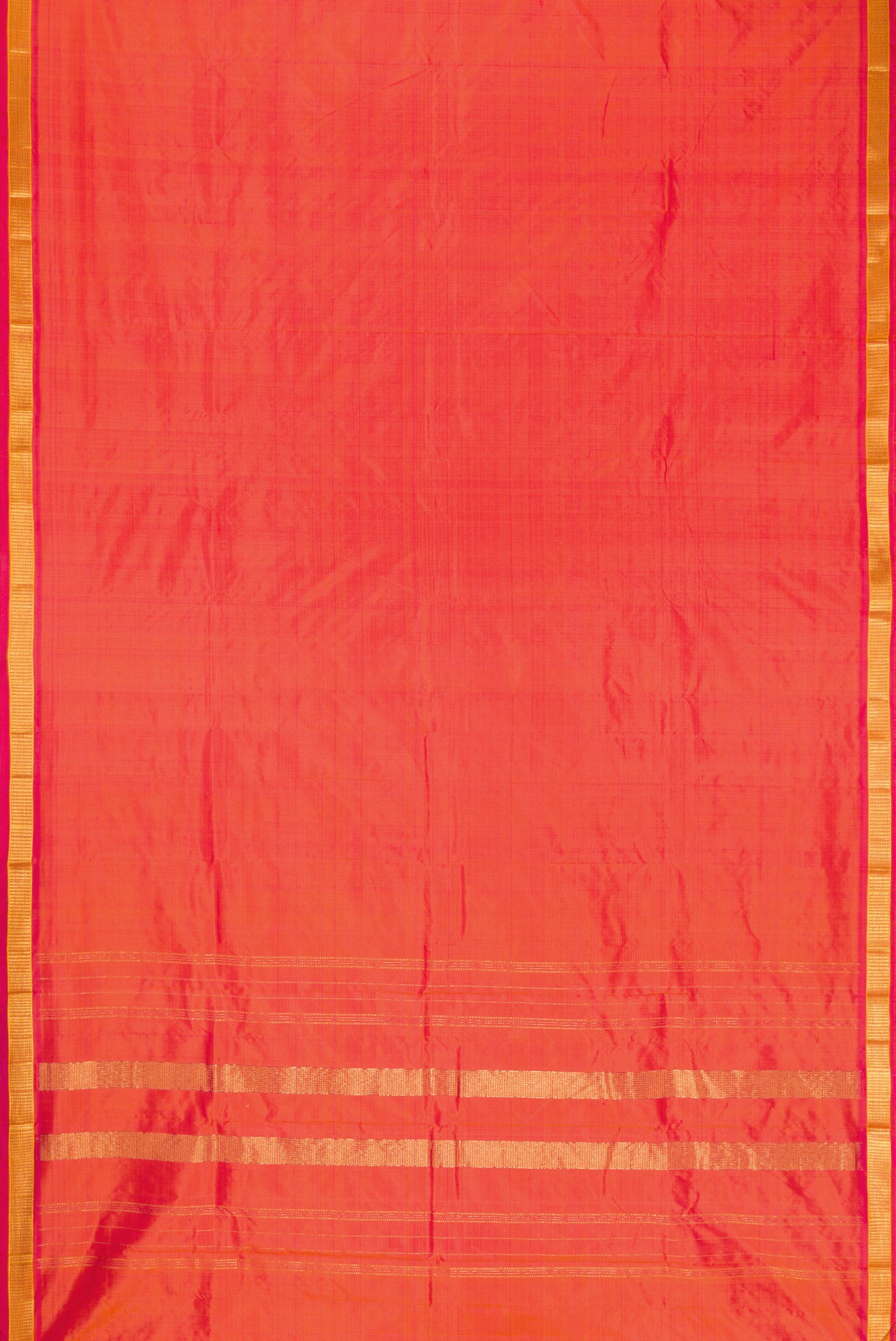 Coral Dual Tone Kanjivaram Silk Saree with Plain Body and Zari Border.  displayed on a mannequin