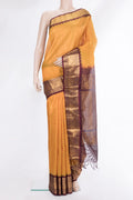 Mustard Silk Cotton Saree with Checked design on the body and Zari Border.  displayed on a mannequin