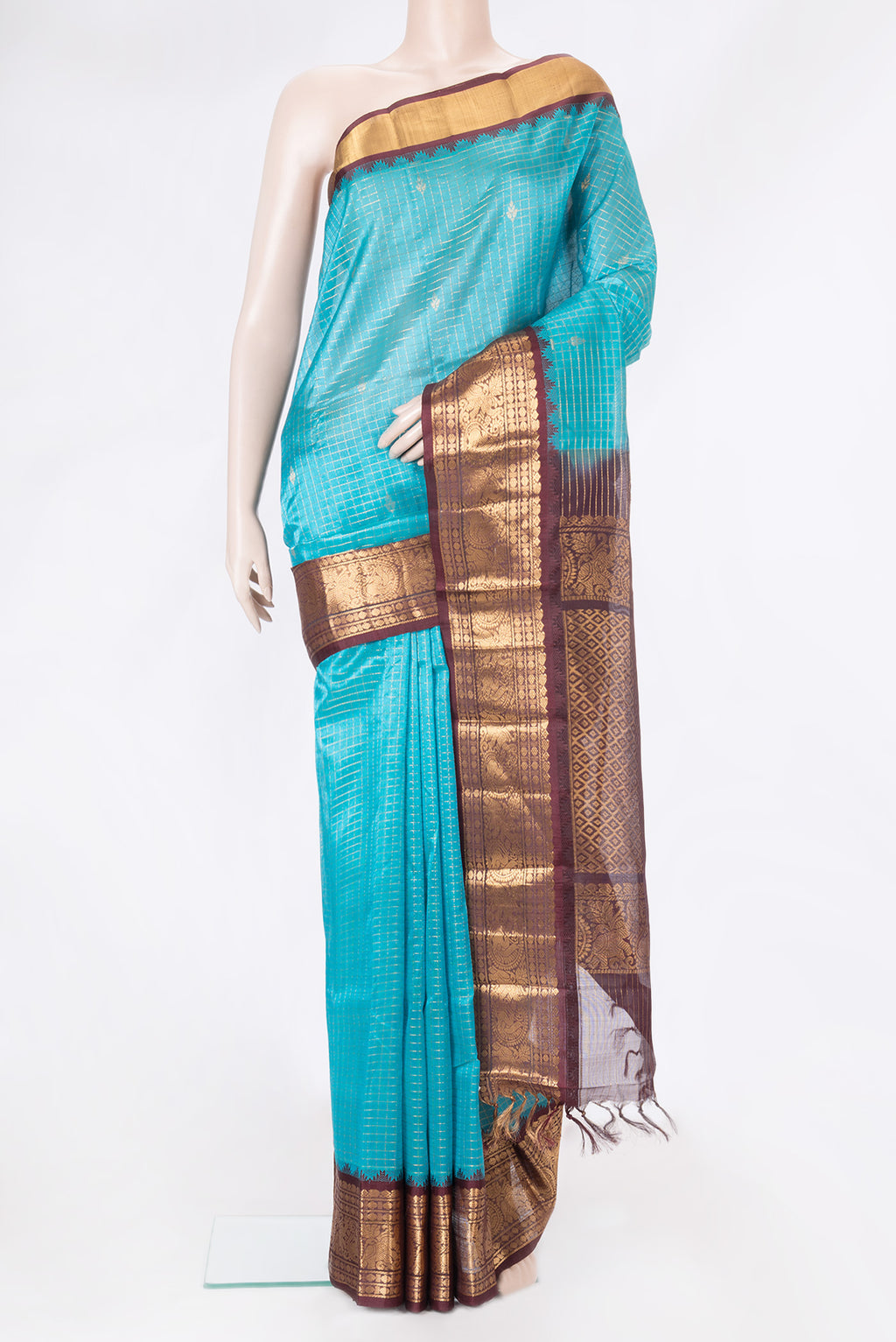 Sky Blue Silk Cotton Saree with Checked design on the body and Zari Border.  displayed on a mannequin