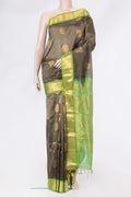 Grey Silk Cotton Saree with Zari Butta on the body and Zari Border.  displayed on a mannequin