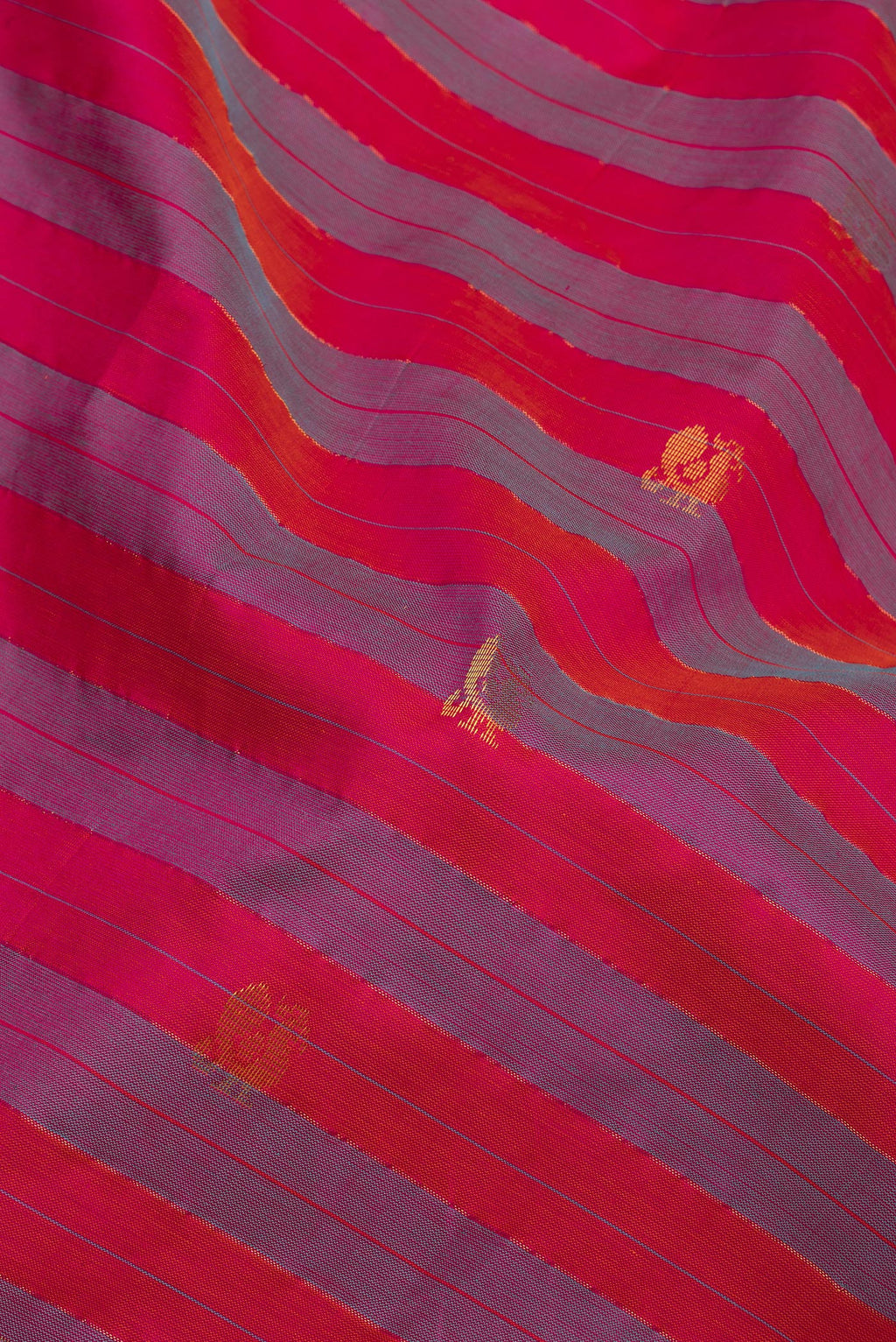 Close up of Multi Color Silk Cotton Saree with Stripes on the body and Zari Border.  displaying folds