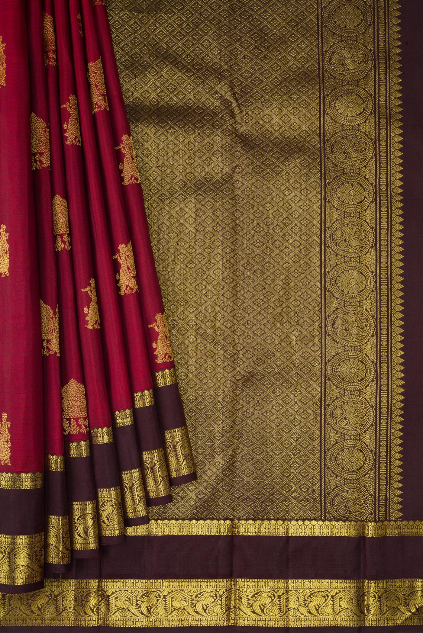 Pleats and pallu of Maroon Kanjivaram Silk Saree with Zari Butta on the body and Zari Border. 