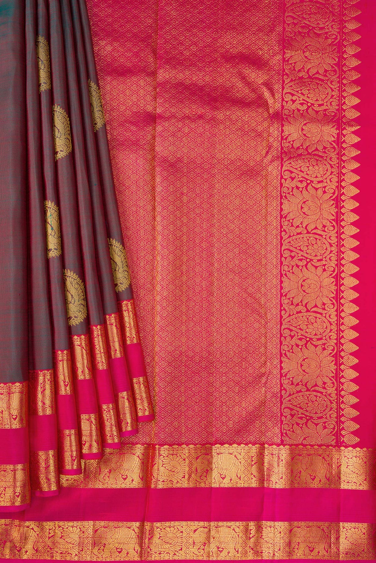 Pleats and pallu of Mehandi Green Dual Tone Kanjivaram Silk Saree with Zari Butta on the body and Zari Border. 