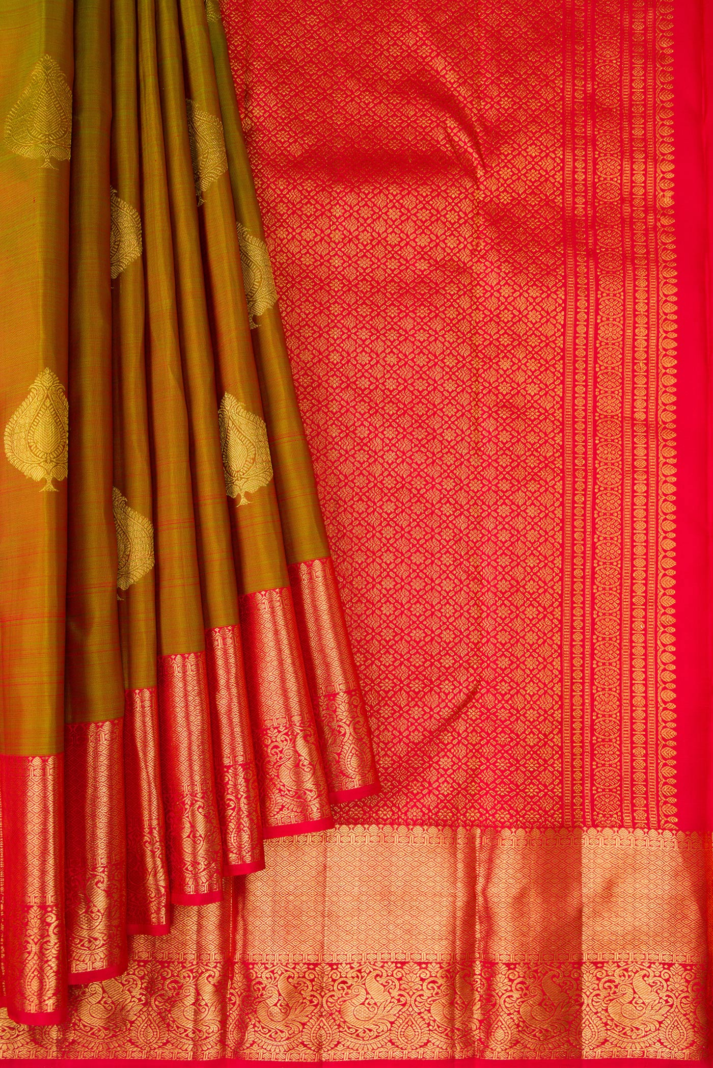 Pleats and pallu of Mehandi Green Dual Tone Kanjivaram Silk Saree with Zari Butta on the body and Zari Border. 