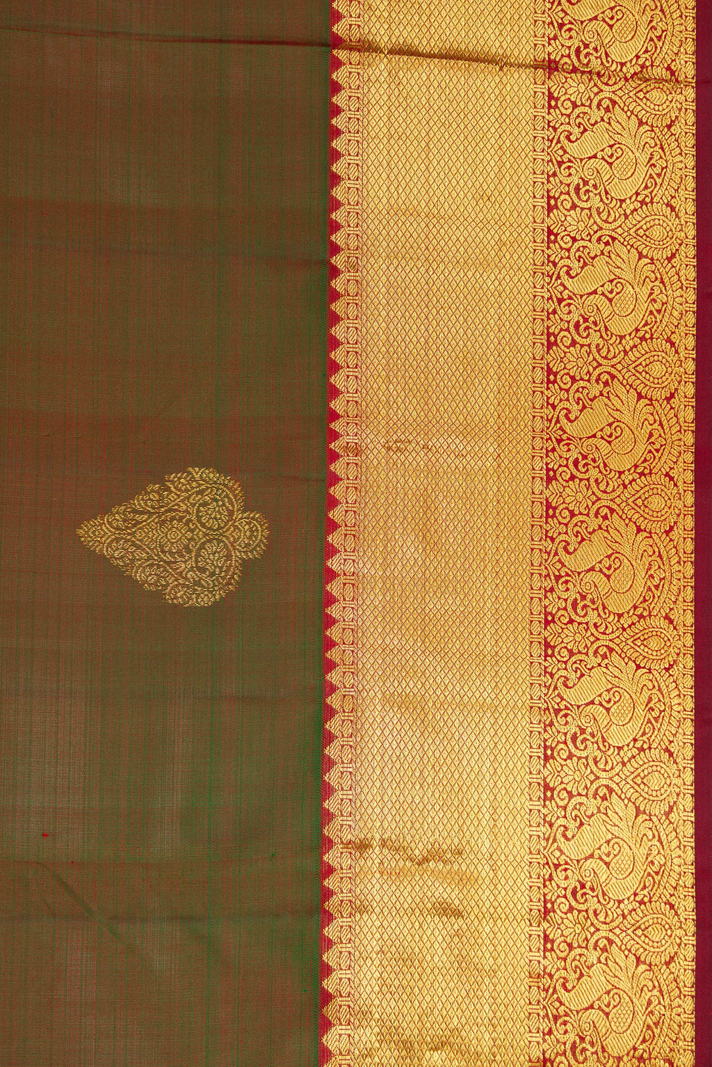 Border image of Mehandi Green Dual Tone Kanjivaram Silk Saree with Zari Butta on the body and Zari Border. 