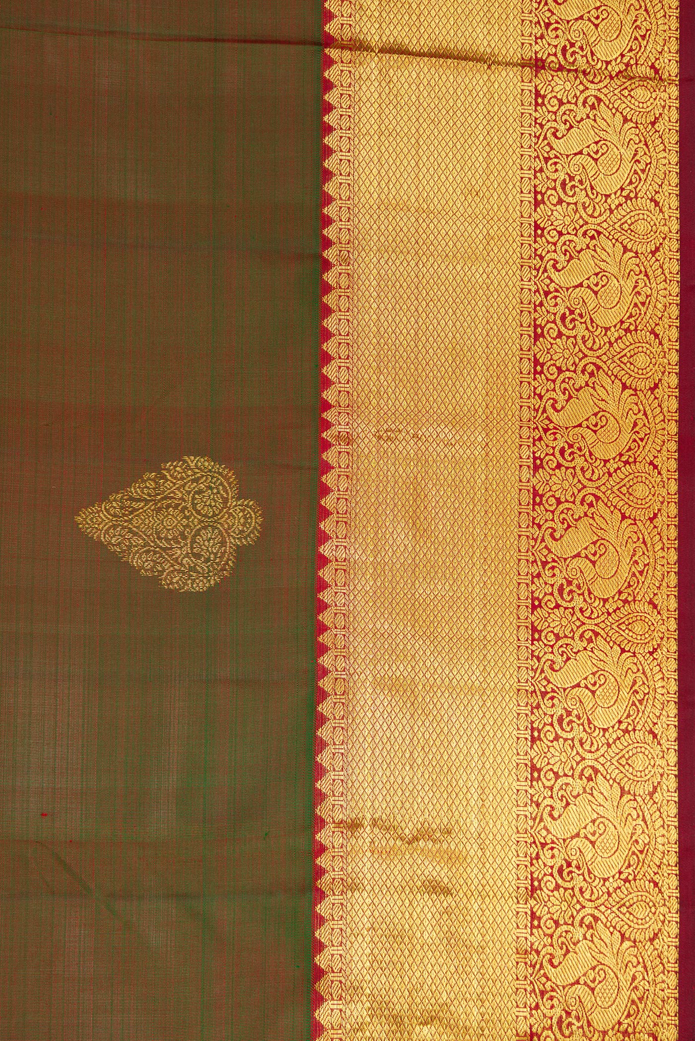 Border image of Mehandi Green Dual Tone Kanjivaram Silk Saree with Zari Butta on the body and Zari Border. 