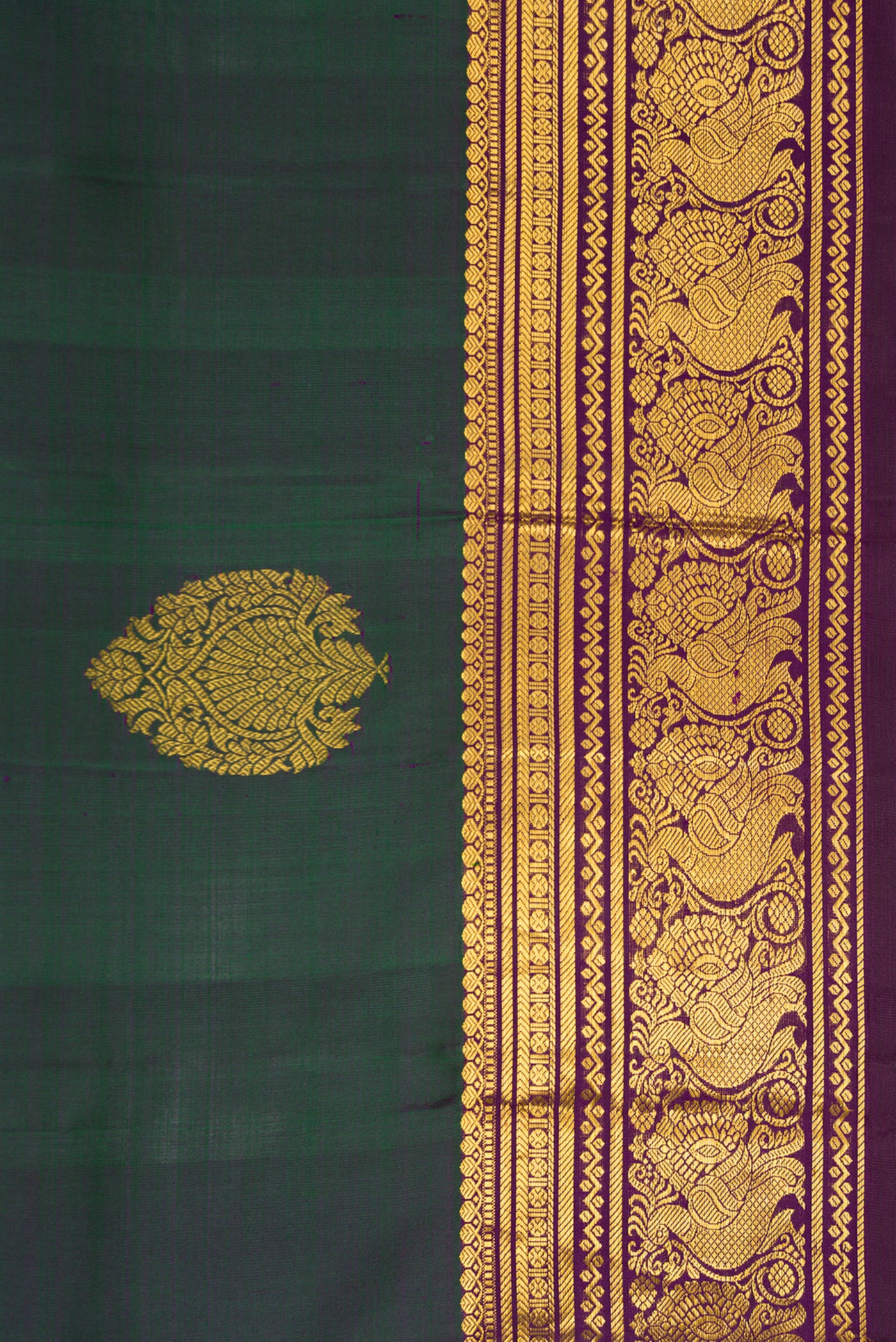 Border image of Bottle Green Dual Tone Kanjivaram Silk Saree with Zari Butta on the body and Zari Border. 
