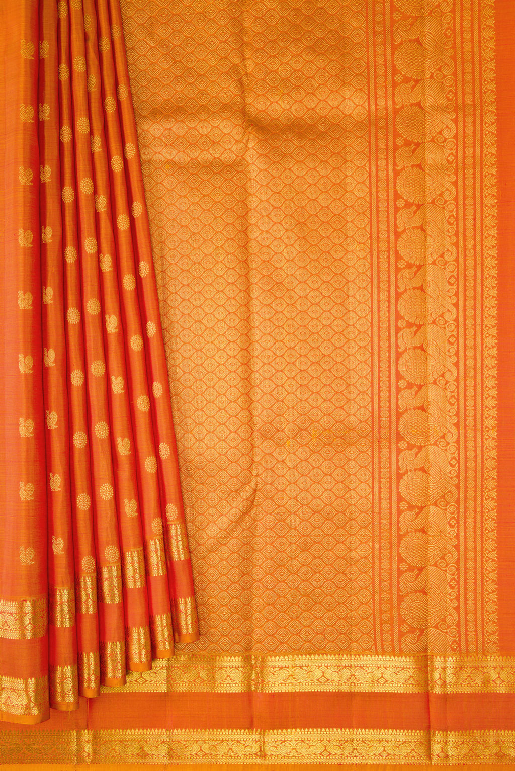 Pleats and pallu of Orange Dual Tone Kanjivaram Silk Saree with Zari Butta on the body and Zari Border. 