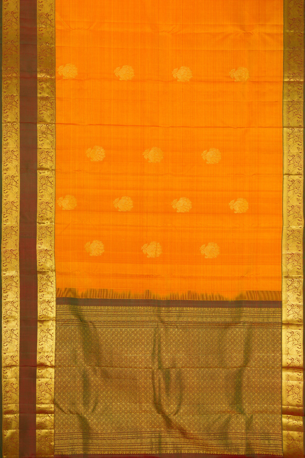 Flat view of Mustard Dual Tone Kanchipuram Silk Saree with Zari Butta on the body and Zari Border. 