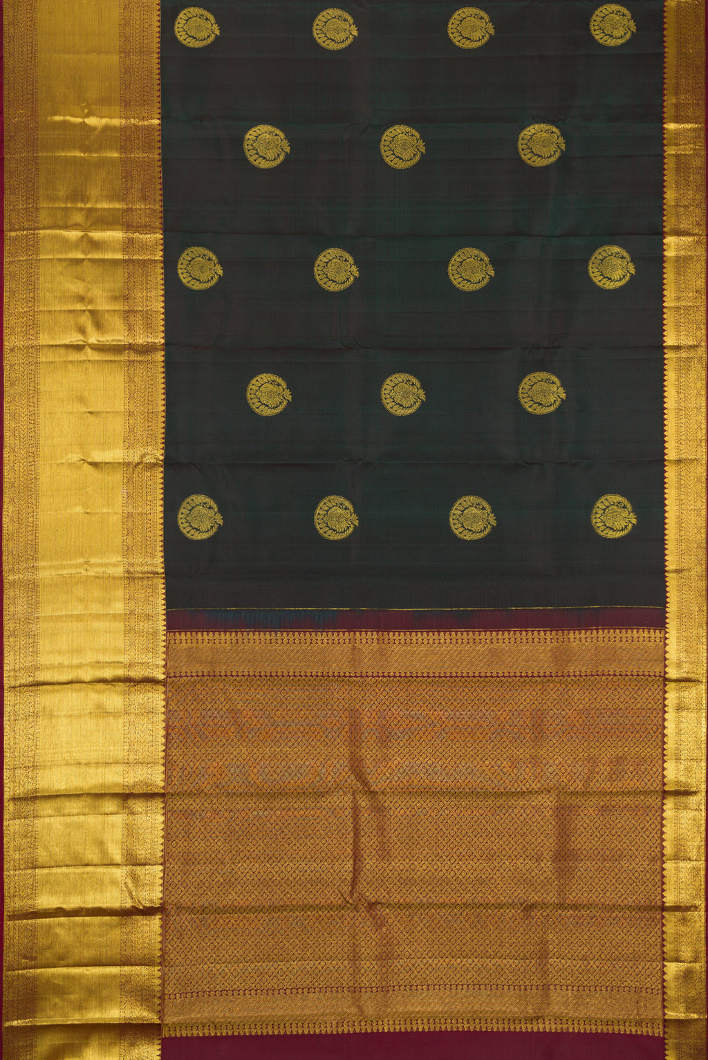 Flat view of Bottle Green Dual Tone Kanchipuram Silk Saree with Zari Butta on the body and Zari Border. 