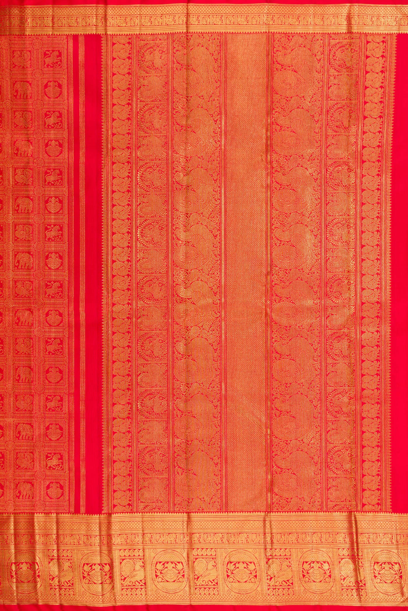 Close up image of the pallu of Pure Silk Pure Zari Red Dual Tone Kanjivaram Saree with Zari Brocade on the body and Zari Border. 