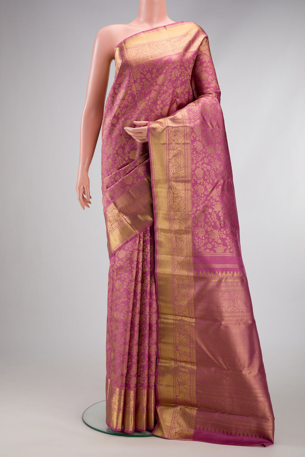 Pure Silk Pure Zari Pink Dual Tone Kanjivaram Saree with Zari Brocade on the body and Zari Border.  displayed on a mannequin