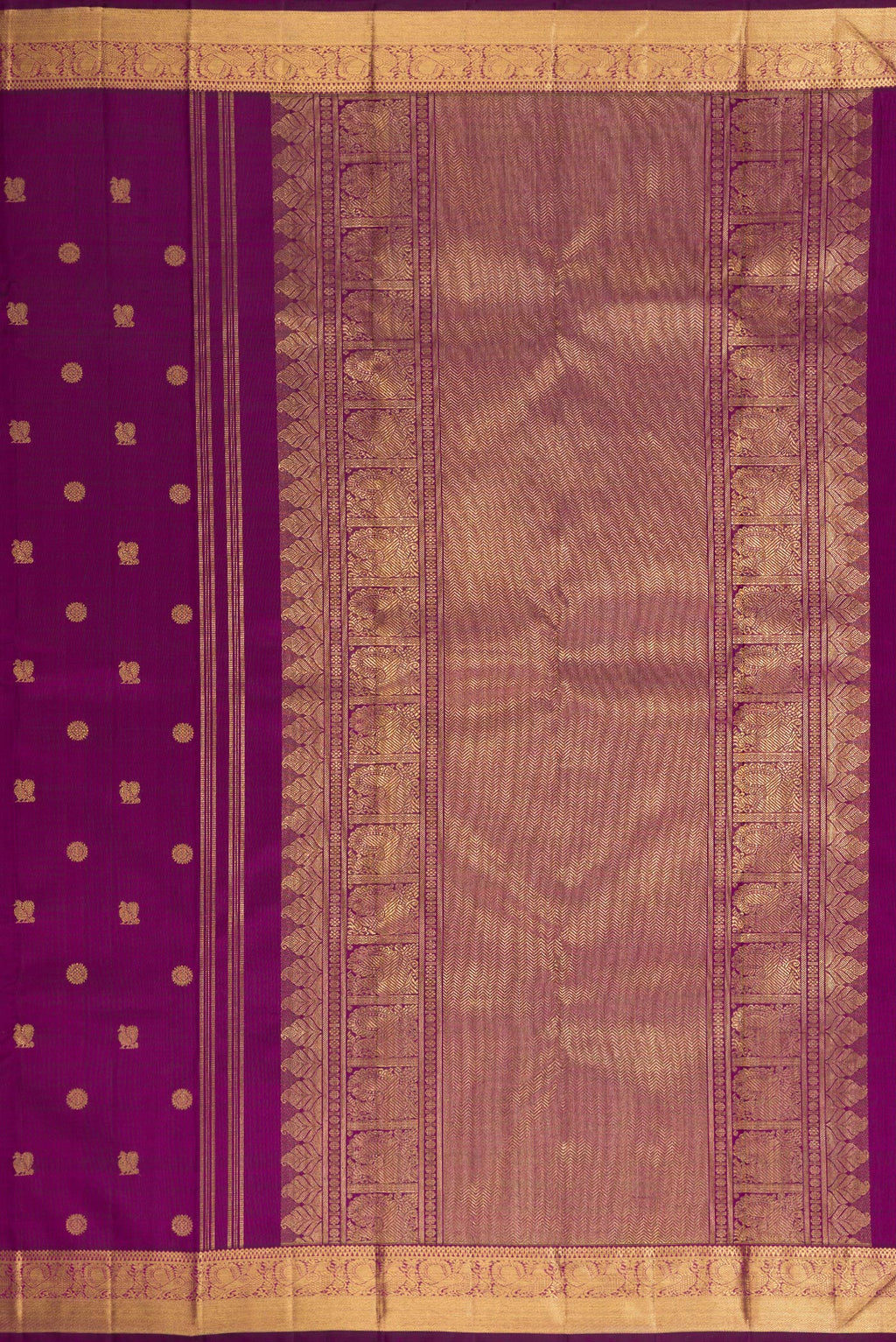 Close up image of the pallu of Pure Silk Pure Zari Purple Dual Tone Kanjivaram Saree with Zari Butta on the body and Zari Border. 