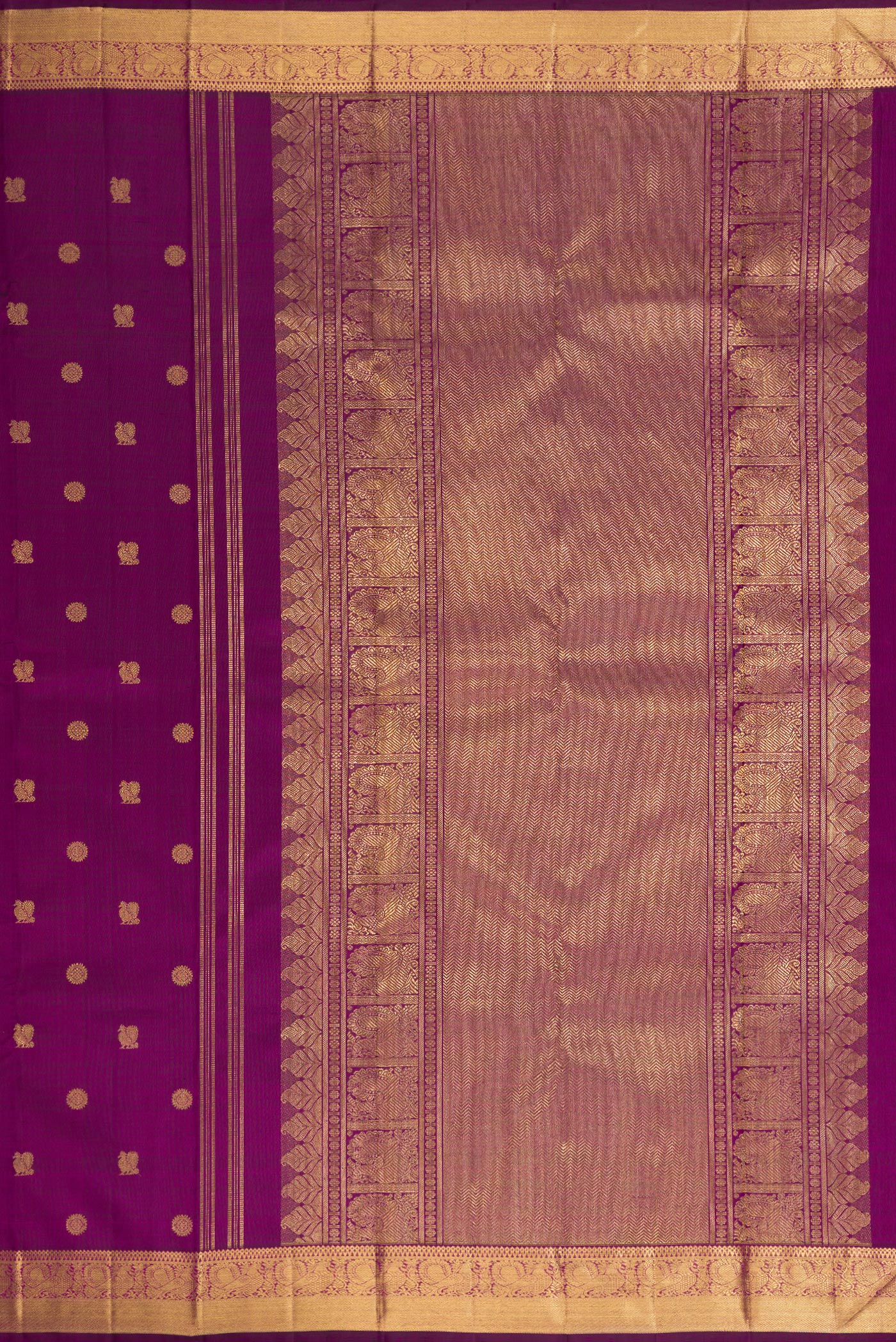 Close up image of the pallu of Pure Silk Pure Zari Purple Dual Tone Kanjivaram Saree with Zari Butta on the body and Zari Border. 