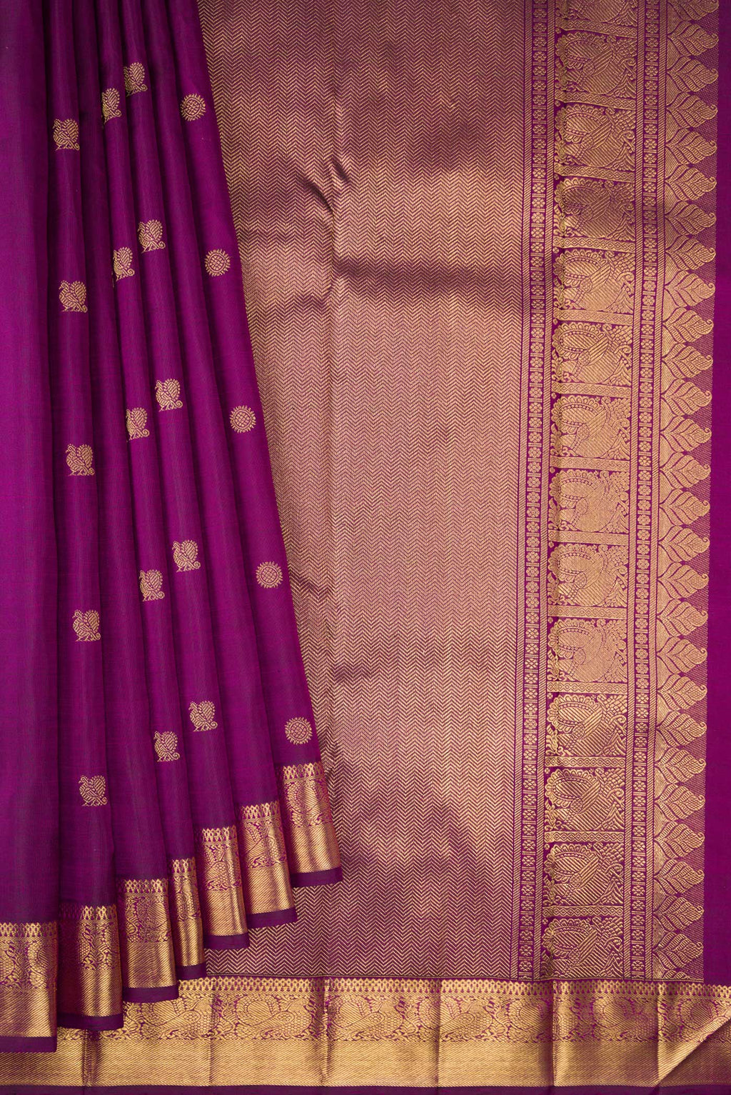 Pleats and pallu of Pure Silk Pure Zari Purple Dual Tone Kanjivaram Saree with Zari Butta on the body and Zari Border. 