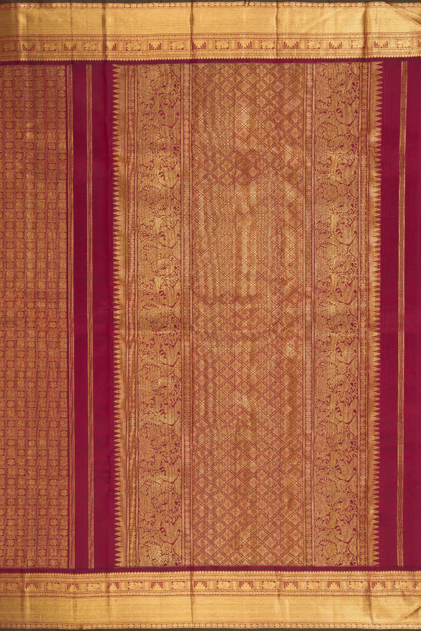 Close up image of the pallu of Pure Silk Pure Zari Maroon Kanjivaram Saree with Zari Brocade on the body and Zari Border. 