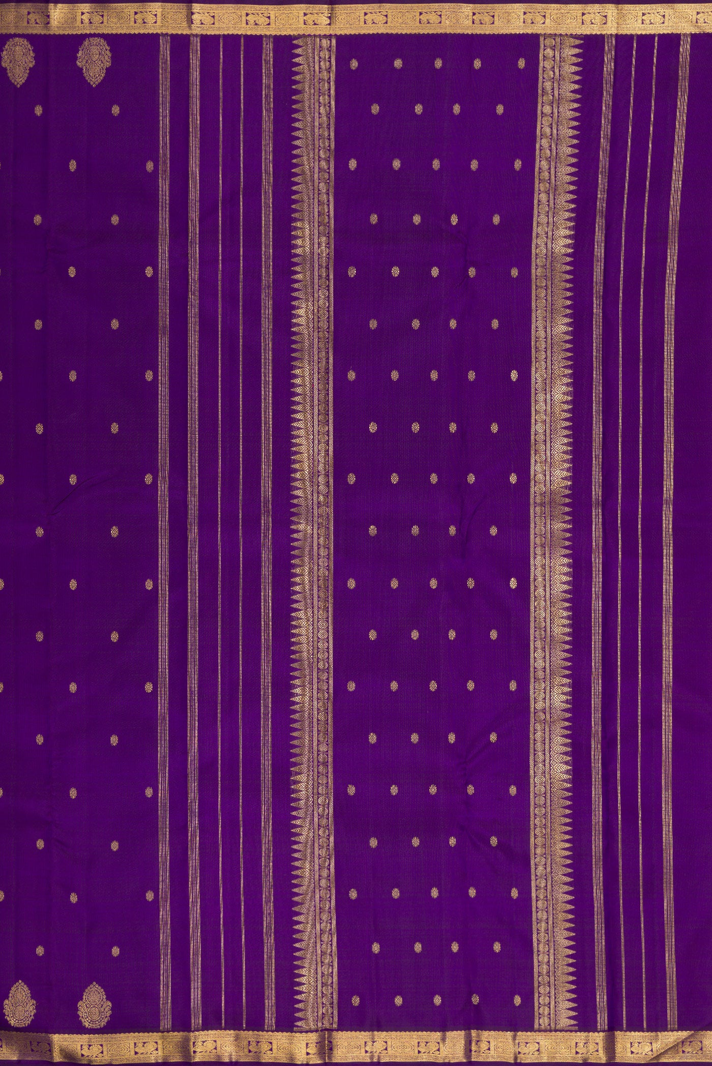 Close up image of the pallu of Pure Silk Pure Zari Royal Blue Dual Tone Kanchipuram Saree with Zari Butta on the body and Zari Border. 