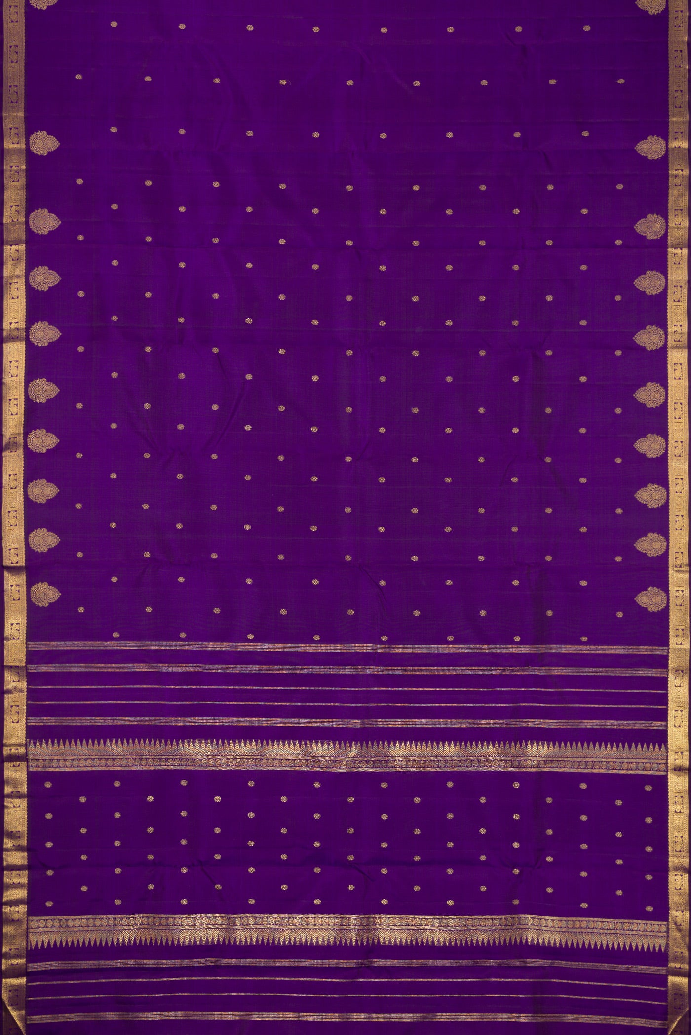 Flat view of Pure Silk Pure Zari Royal Blue Dual Tone Kanchipuram Saree with Zari Butta on the body and Zari Border. 