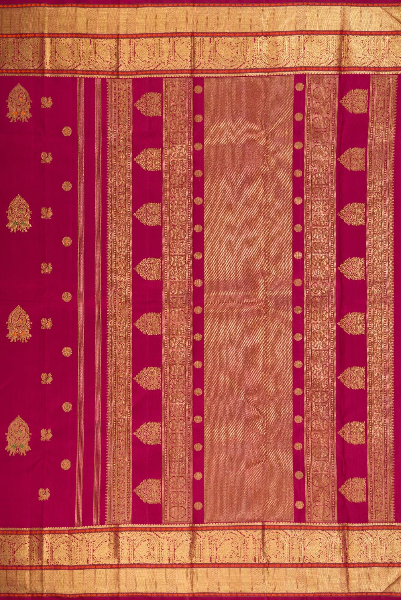 Close up image of the pallu of Pure Silk Pure Zari Dark Mauve Dual Tone Kanjivaram Saree with Zari Butta on the body and Zari Border. 