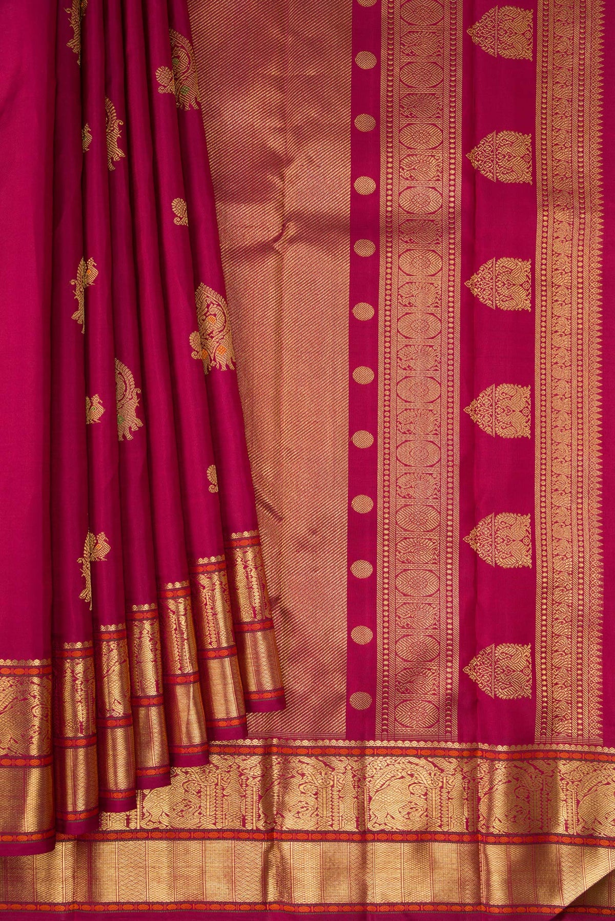 Pleats and pallu of Pure Silk Pure Zari Dark Mauve Dual Tone Kanjivaram Saree with Zari Butta on the body and Zari Border. 