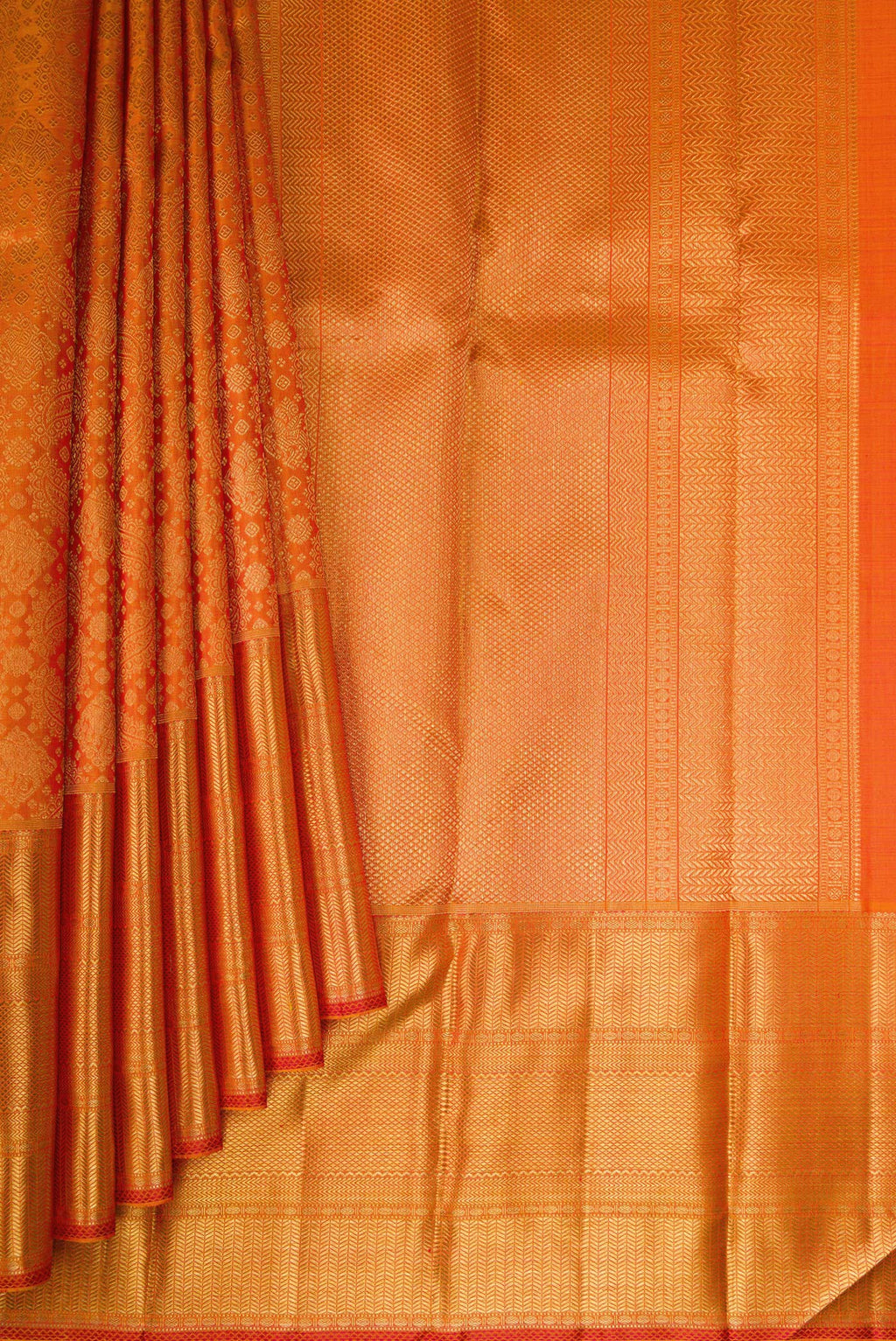 Pleats and pallu of Pure Silk Pure Zari Orange Kanjivaram Saree with Zari Brocade on the body and Zari Border. 