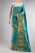Pure Silk Pure Zari Sky Blue Kanjivaram Saree with Zari Brocade on the body and Zari Border.  displayed on a mannequin