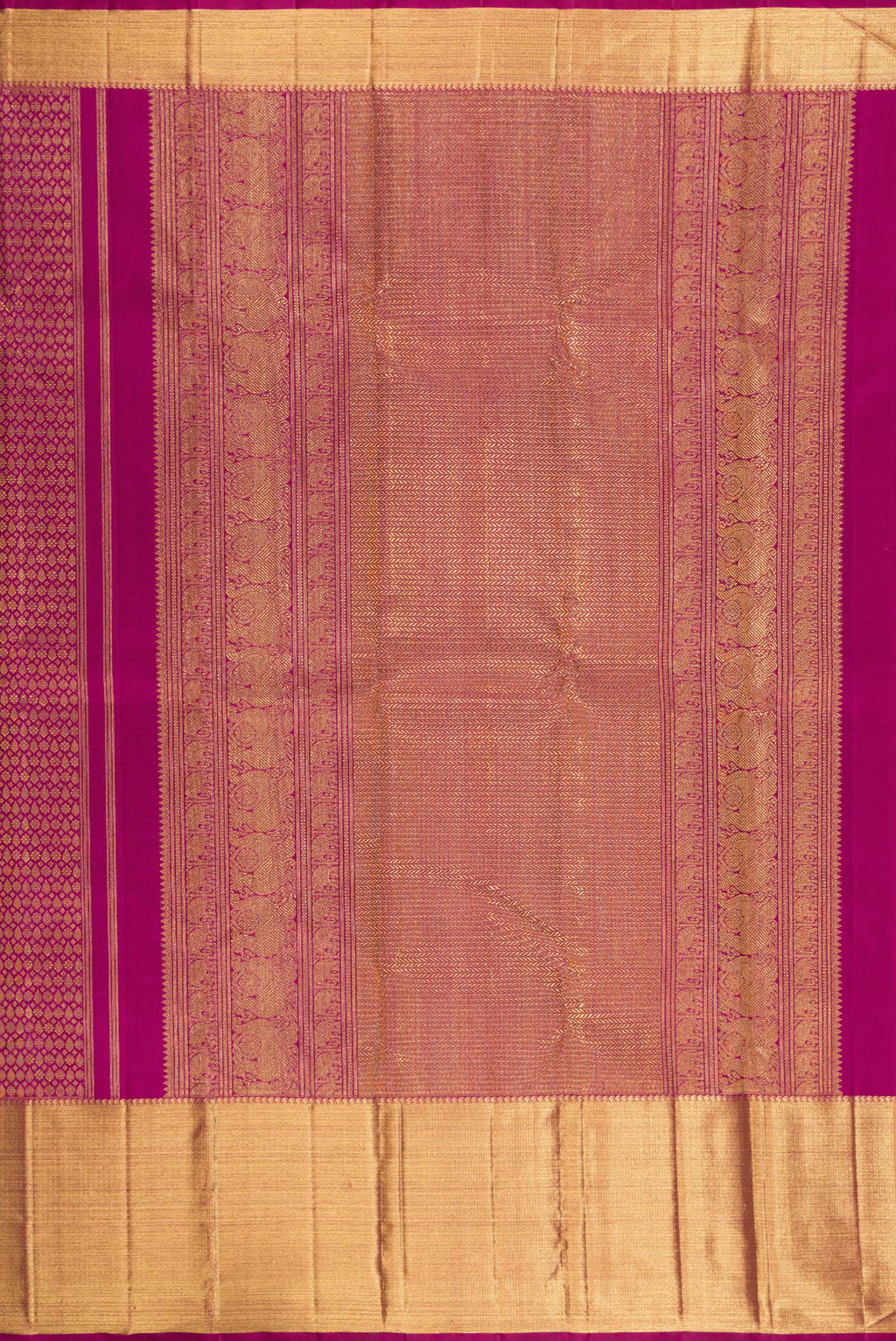 Close up image of the pallu of Pure Silk Pure Zari Magenta Kanjivaram Saree with Zari Brocade on the body and Zari Border. 