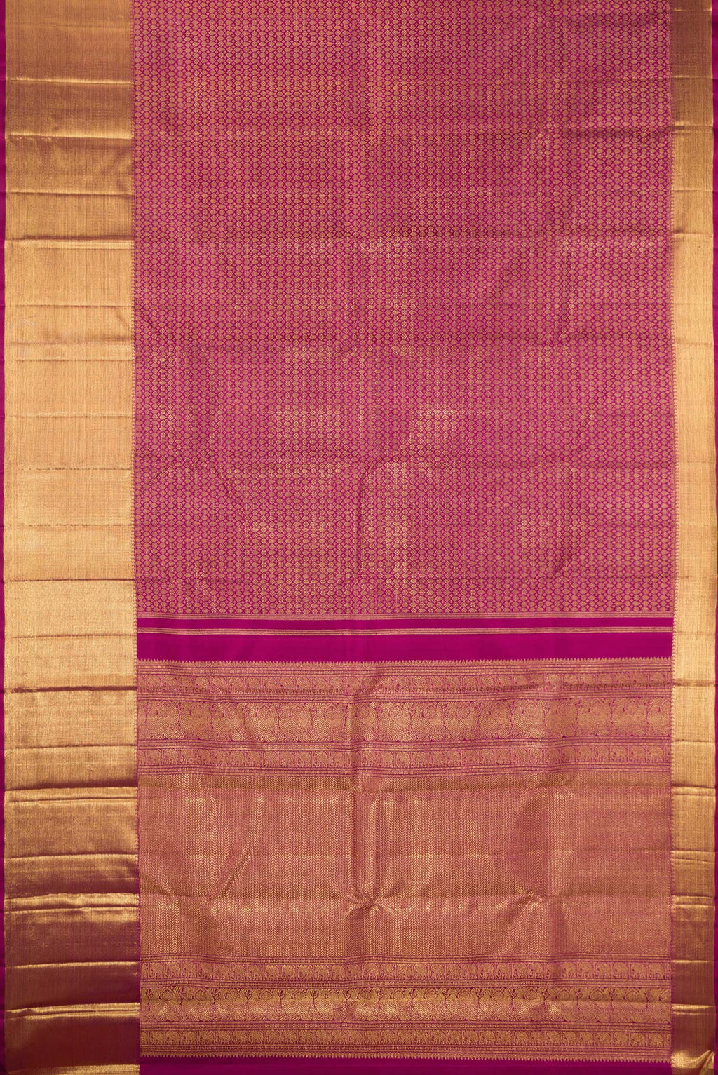 Flat view of Pure Silk Pure Zari Magenta Kanjivaram Saree with Zari Brocade on the body and Zari Border. 