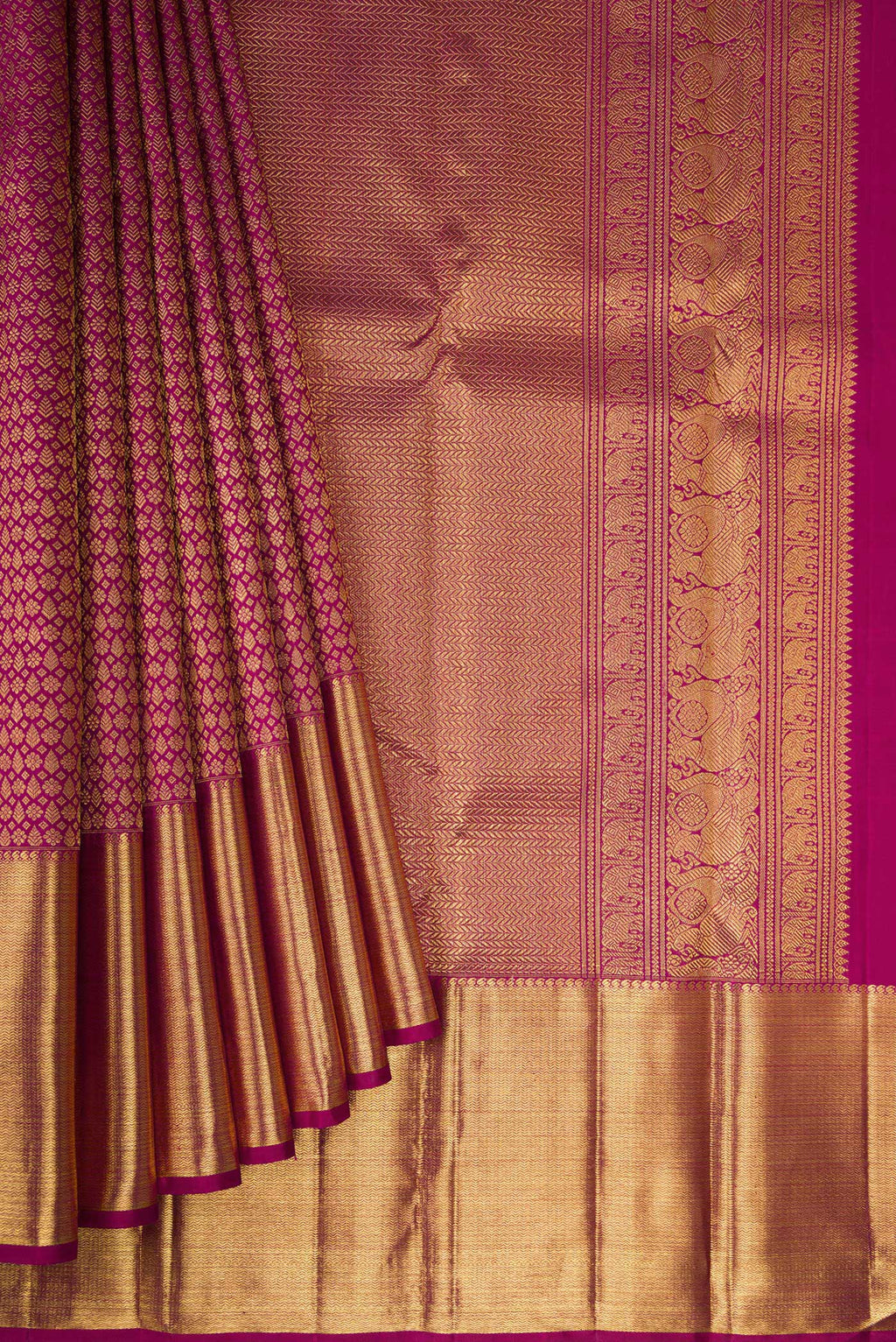Pleats and pallu of Pure Silk Pure Zari Magenta Kanjivaram Saree with Zari Brocade on the body and Zari Border. 