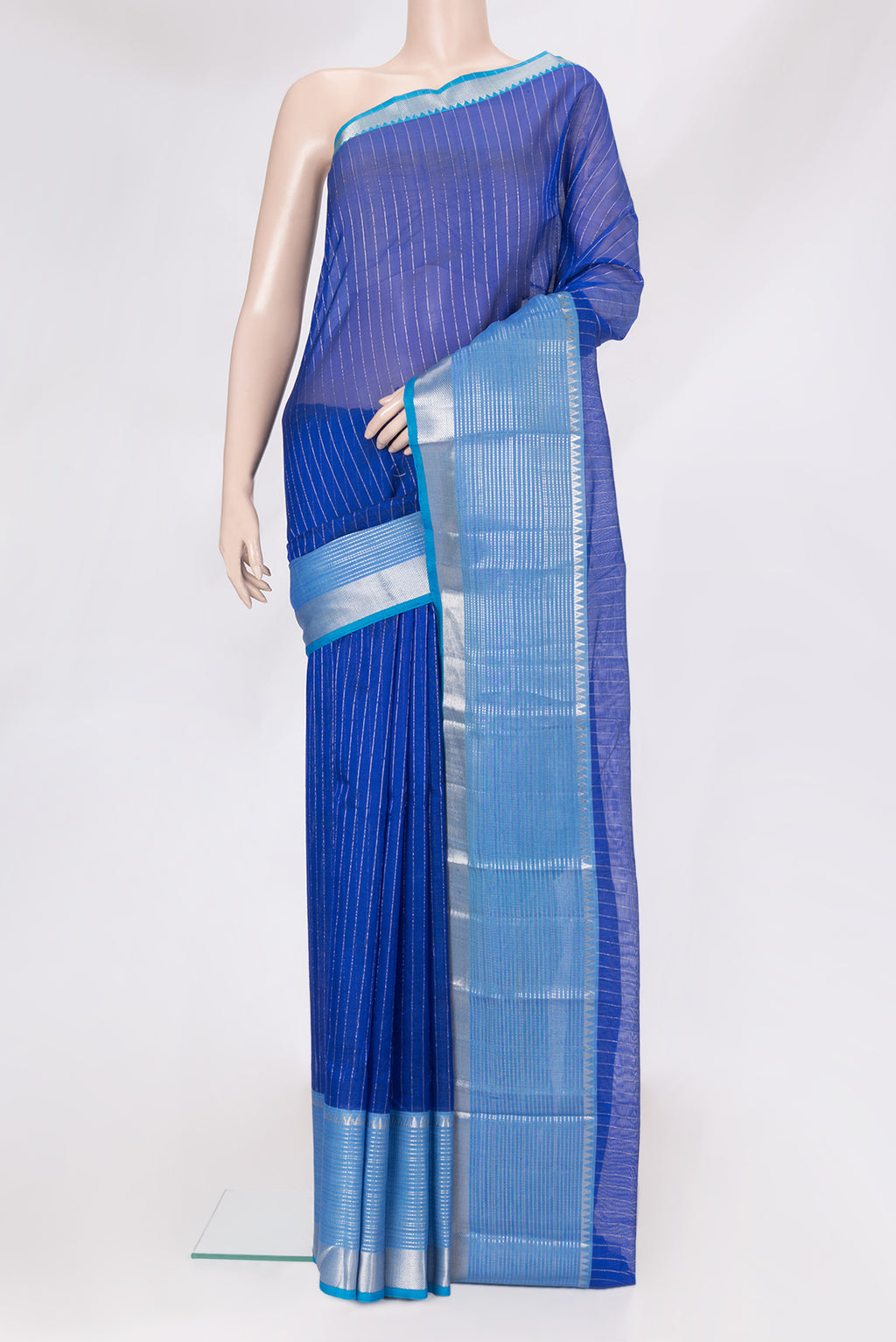 Royal Blue Silk Cotton Saree with Stripes on the body and Zari Border.  displayed on a mannequin