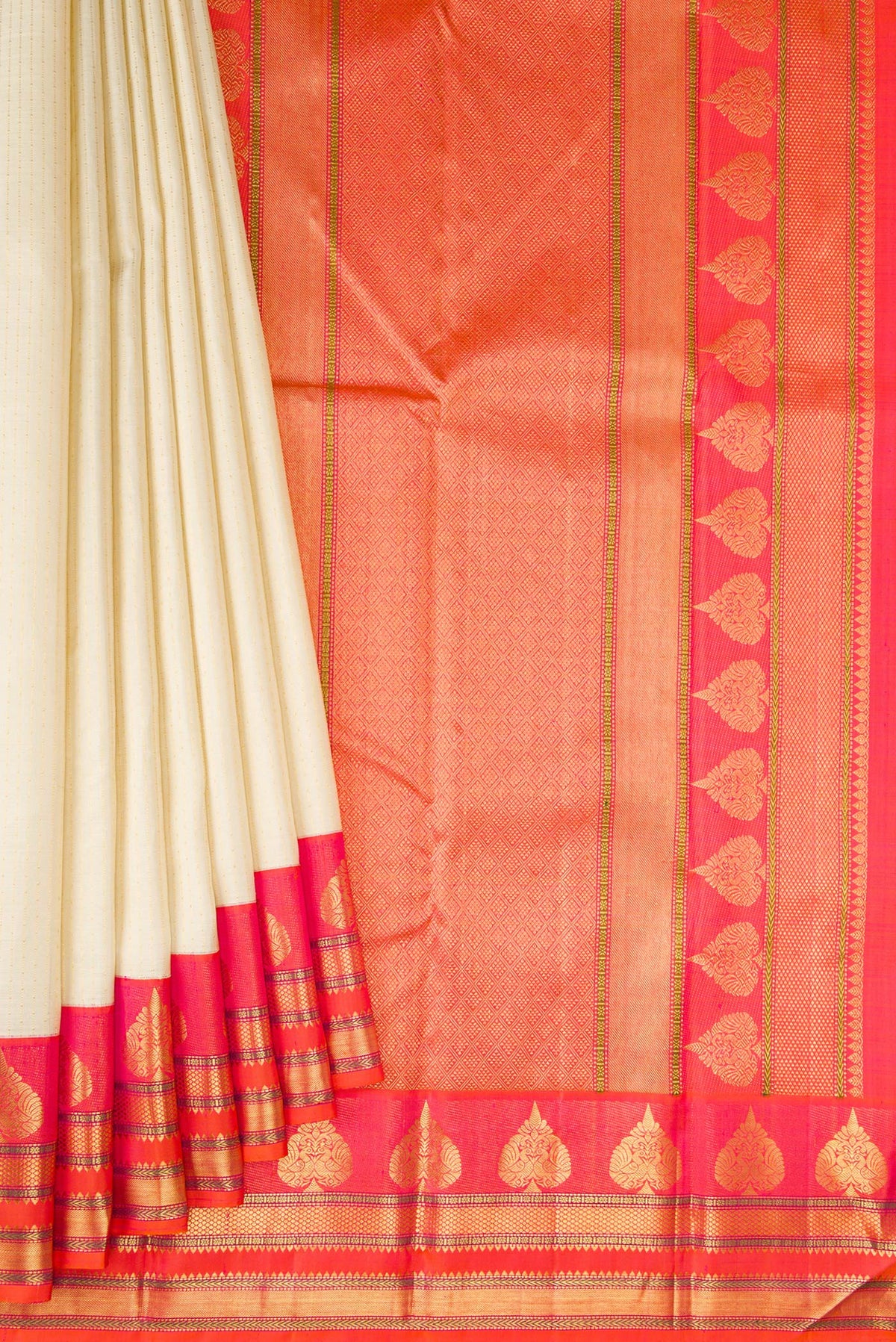 Pleats and pallu of Beige Dual Tone Kanchipuram Silk Saree with Stripes on the body and Fancy Border. 