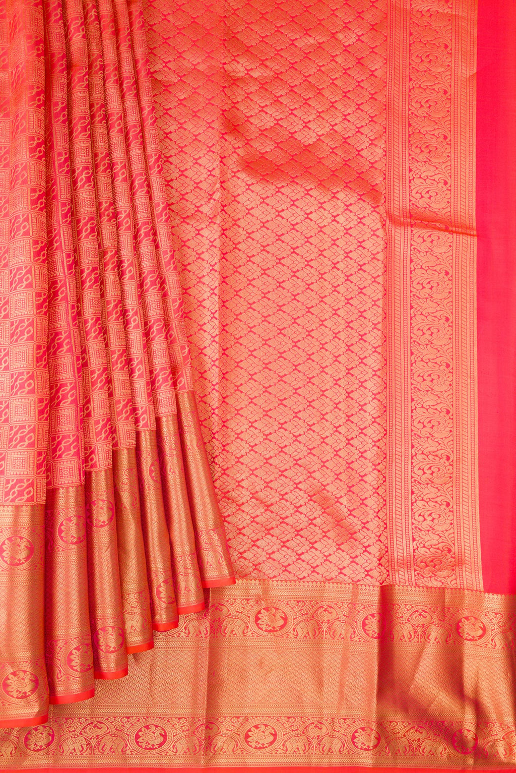 Pleats and pallu of Pure Silk Brick Orange Dual Tone Kanchipuram Saree with Zari Brocade on the body and Zari Border. 