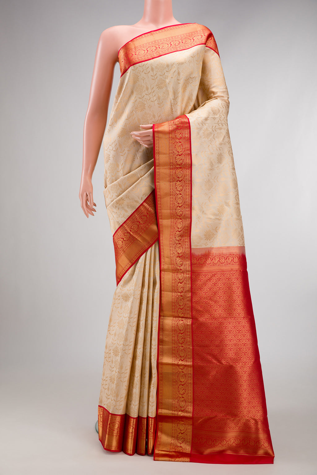Sandal Kanjivaram Silk Saree with Zari Brocade on the body and Zari Border.  displayed on a mannequin