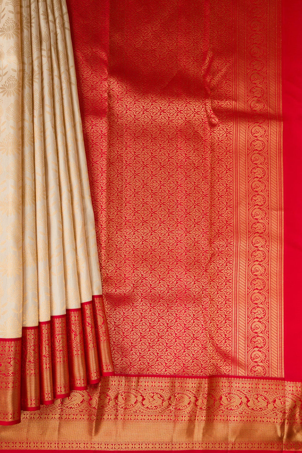 Pleats and pallu of Sandal Kanjivaram Silk Saree with Zari Brocade on the body and Zari Border. 
