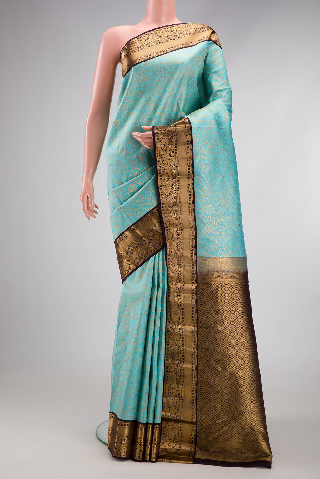 Sky Blue Kanjivaram Silk Saree with Zari Brocade on the body and Zari Border.  displayed on a mannequin