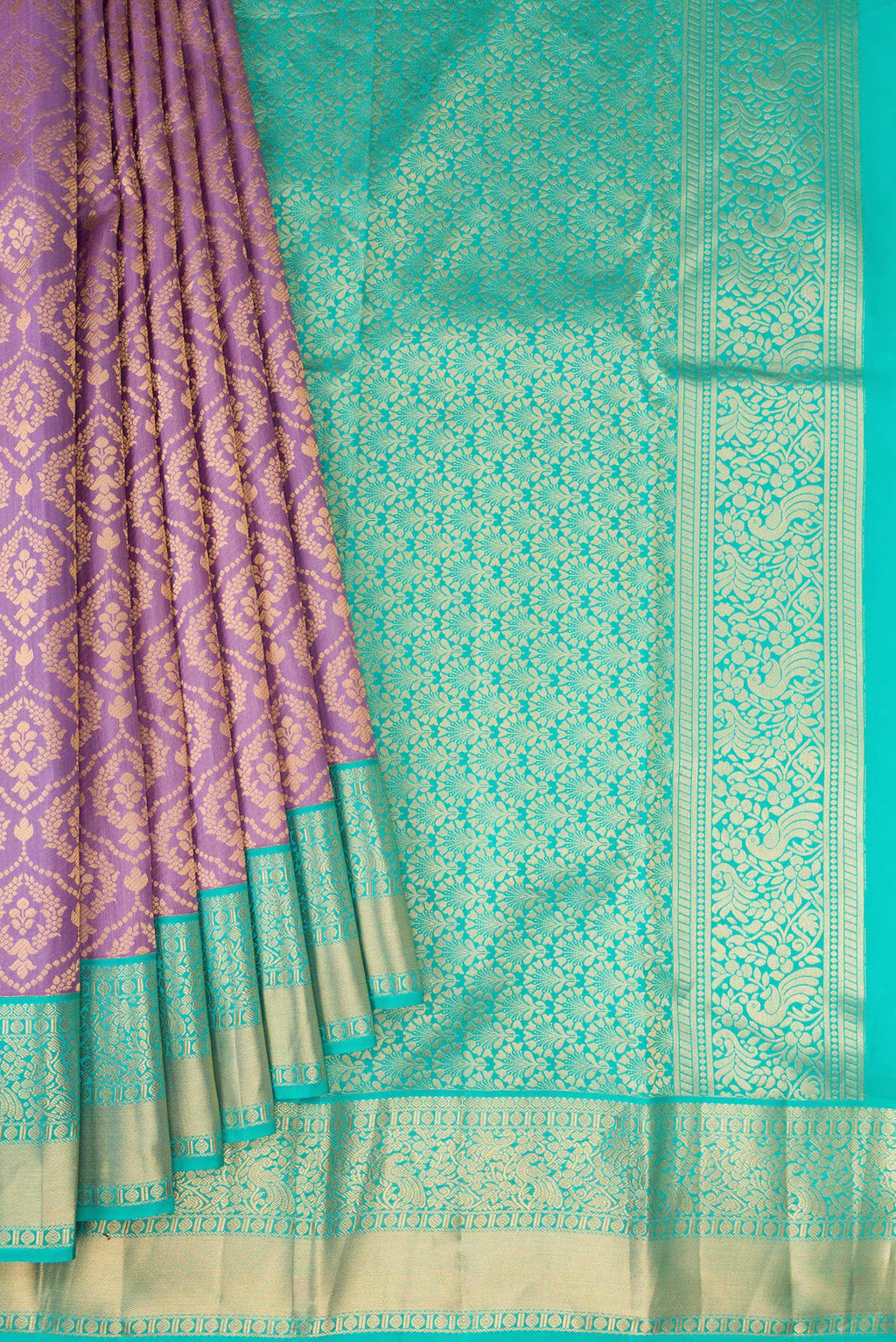 Pleats and pallu of Lavender Kanjivaram Silk Saree with Zari Brocade on the body and Zari Border. 