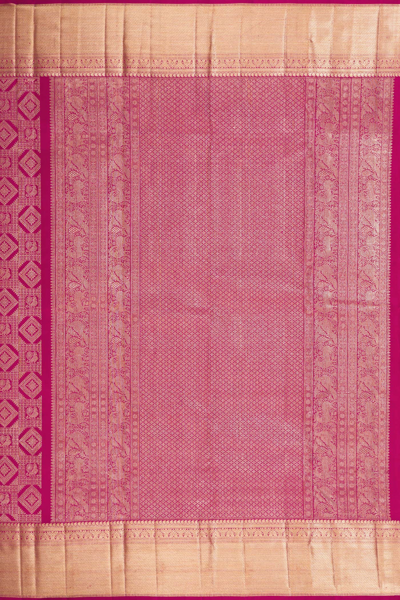Close up image of the pallu of Magenta Dual Tone Kanchipuram Silk Saree with Zari Brocade on the body and Zari Border. 