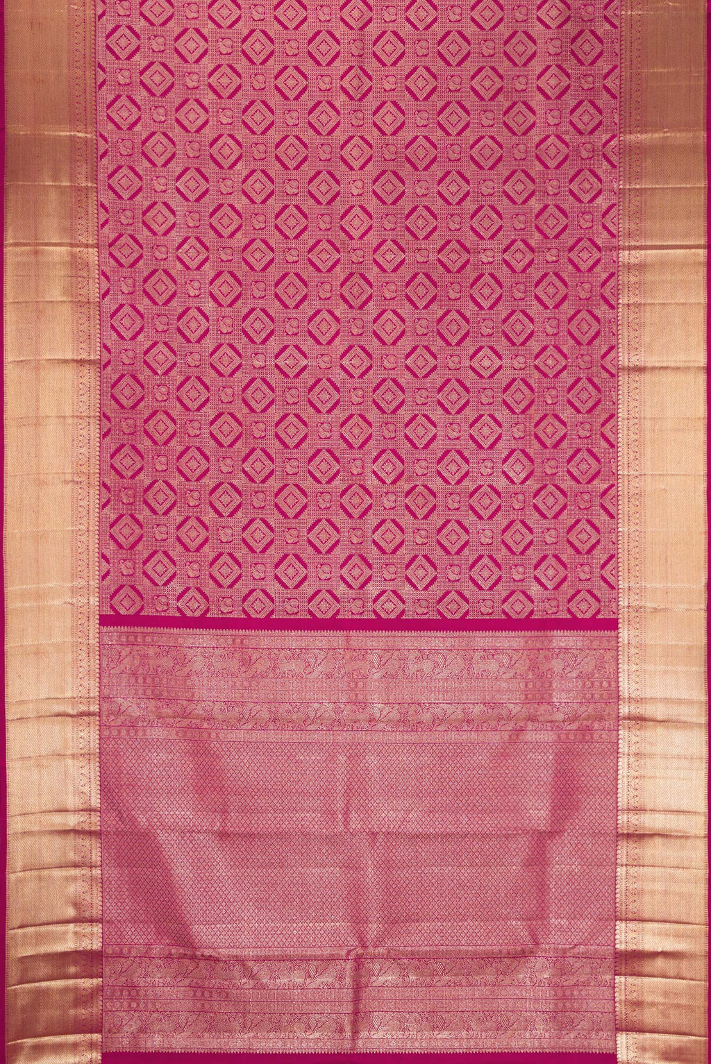 Flat view of Magenta Dual Tone Kanchipuram Silk Saree with Zari Brocade on the body and Zari Border. 