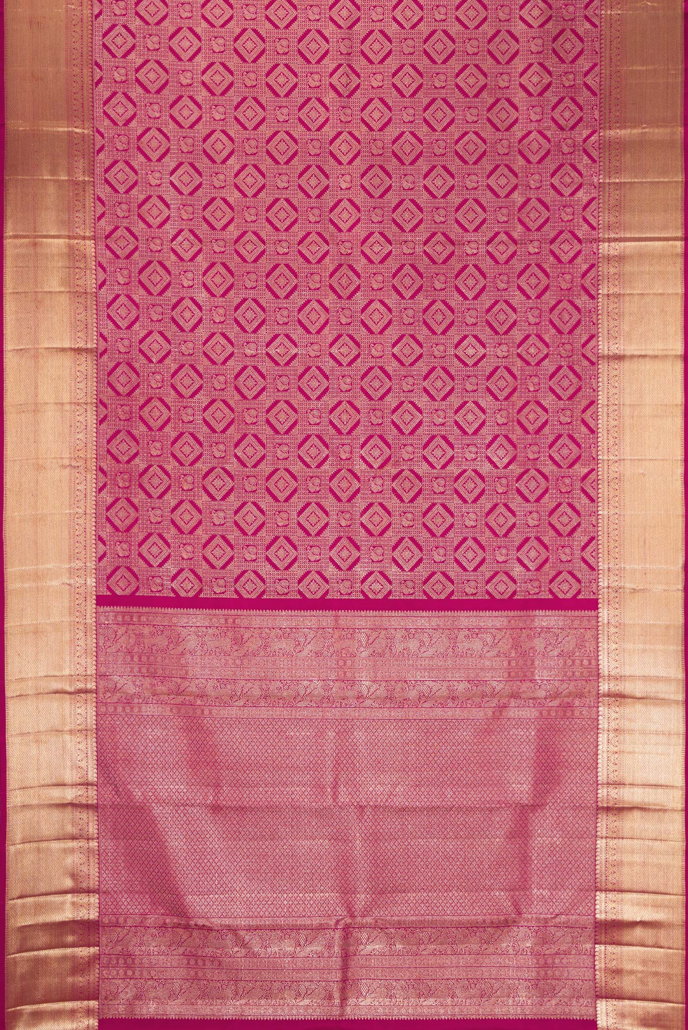 Flat view of Magenta Dual Tone Kanchipuram Silk Saree with Zari Brocade on the body and Zari Border. 