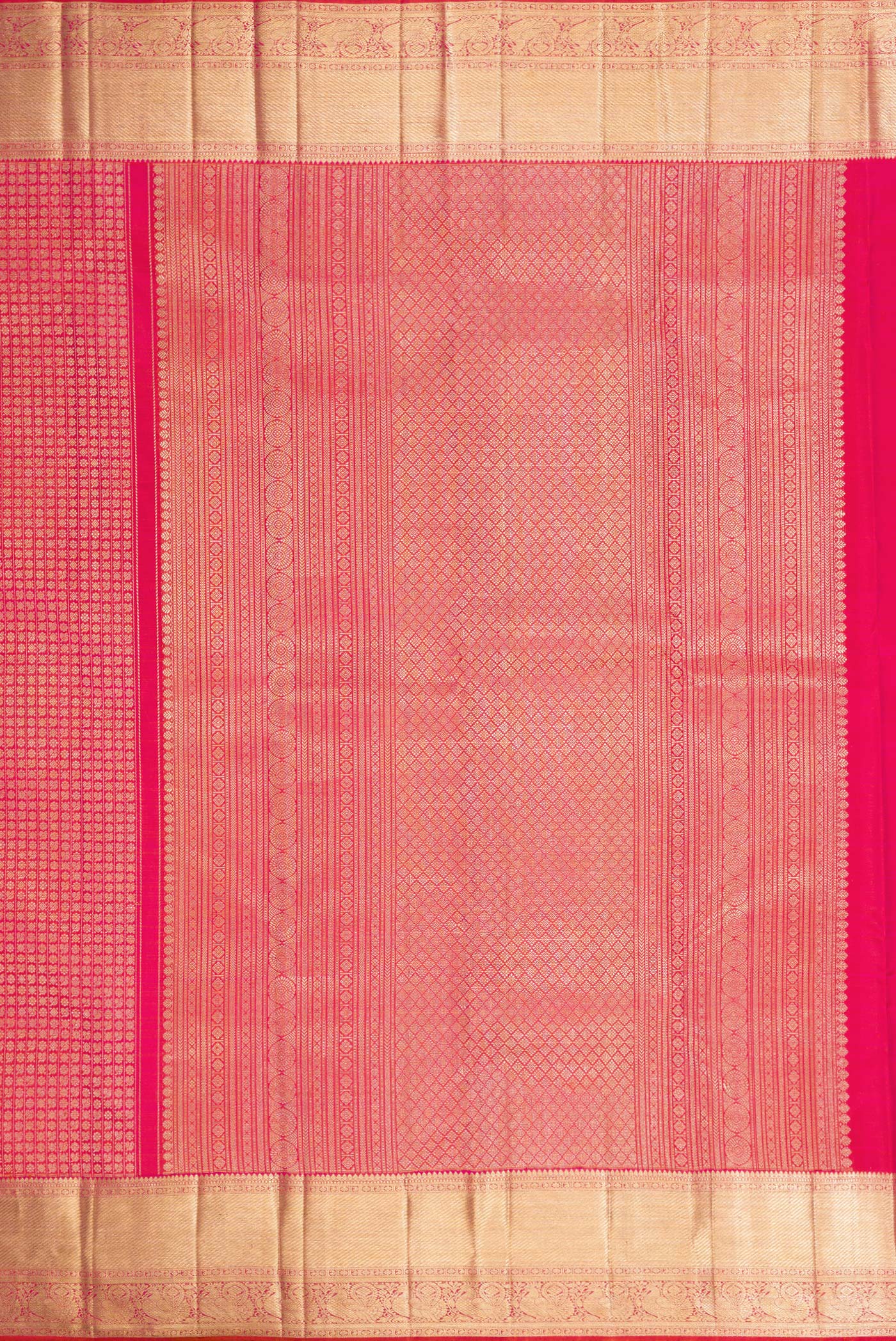 Close up image of the pallu of Coral Dual Tone Kanchipuram Silk Saree with Zari Brocade on the body and Zari Border. 