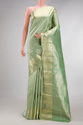 Pista Green Dual Tone Kanchipuram Silk Saree with Zari Brocade on the body and Zari Border.  displayed on a mannequin