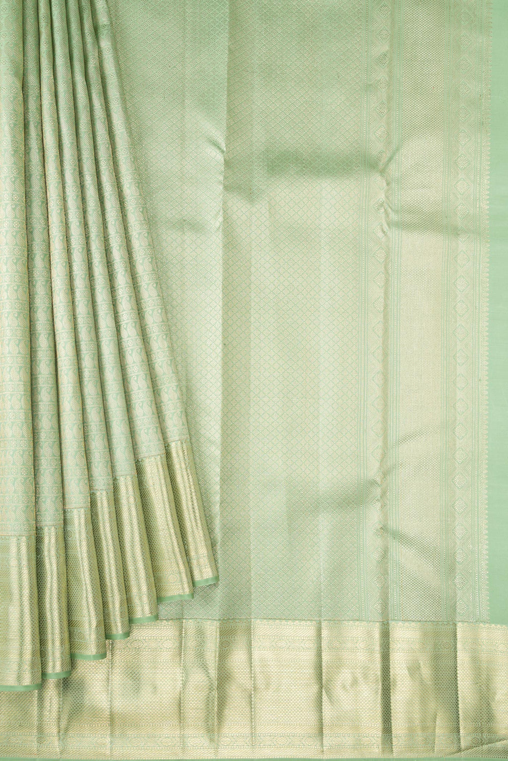 Pleats and pallu of Pista Green Dual Tone Kanchipuram Silk Saree with Zari Brocade on the body and Zari Border. 