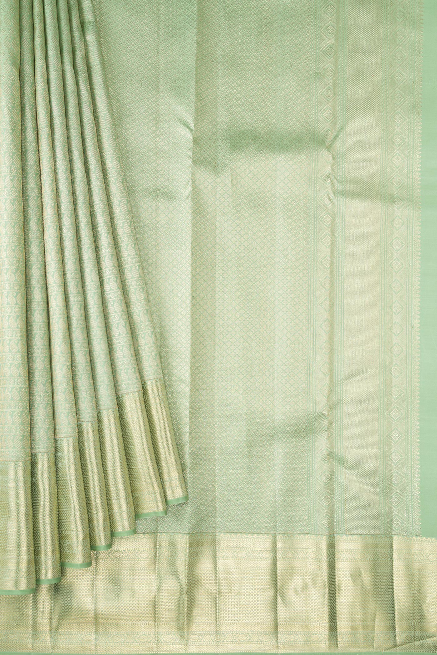Pleats and pallu of Pista Green Dual Tone Kanchipuram Silk Saree with Zari Brocade on the body and Zari Border. 