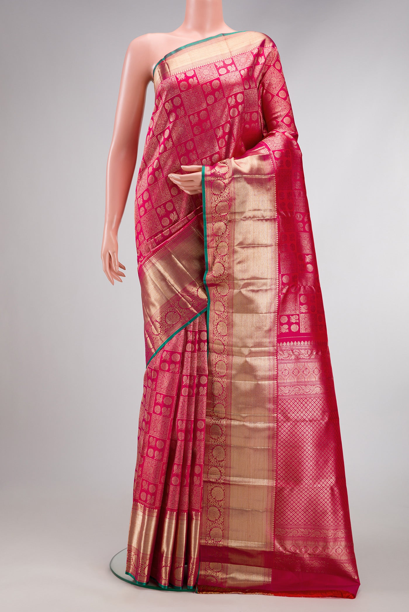 Pink Dual Tone Kanchipuram Silk Saree with Zari Brocade on the body and Zari Border.  displayed on a mannequin