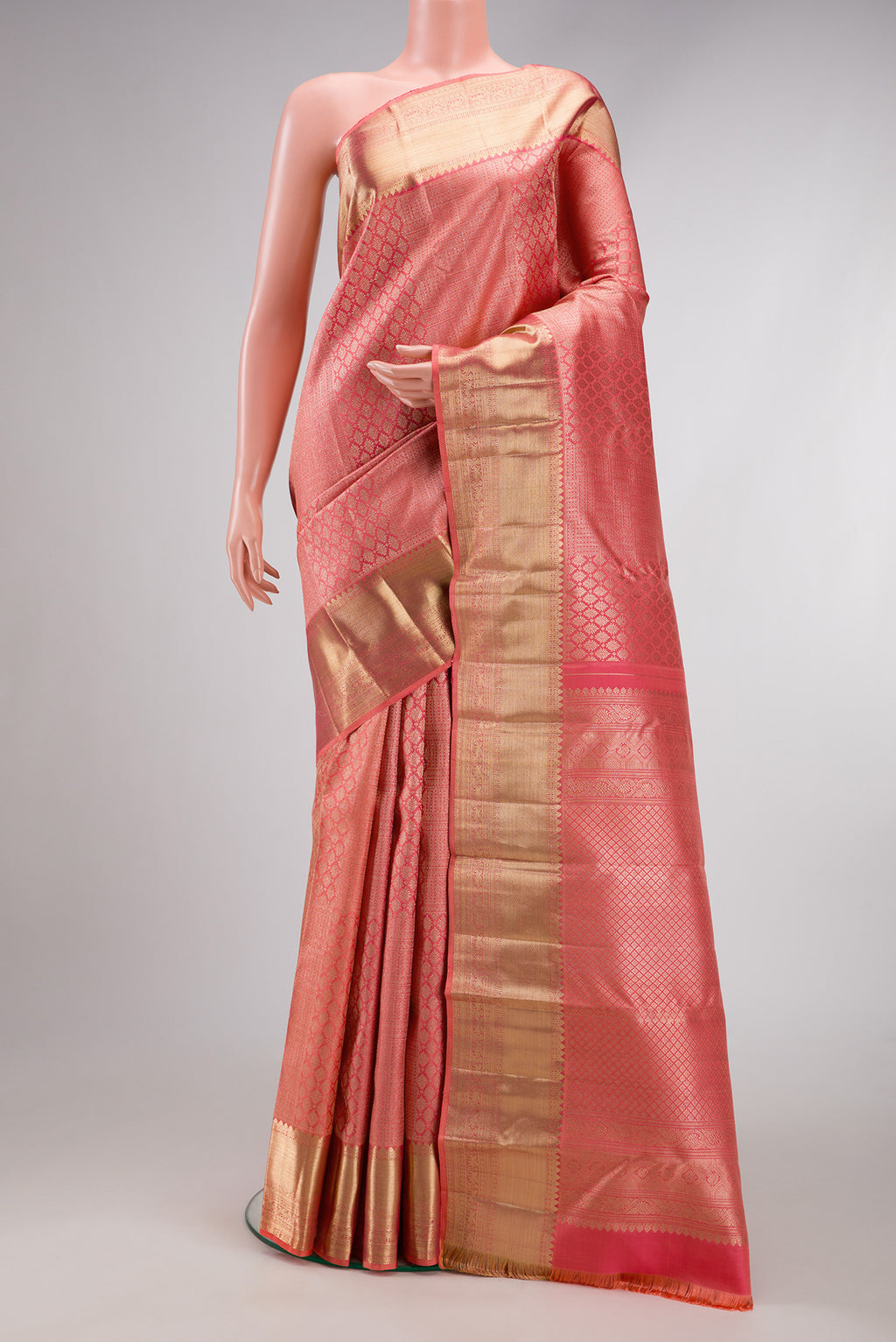 Pink Dual Tone Kanchipuram Silk Saree with Zari Brocade on the body and Zari Border.  displayed on a mannequin