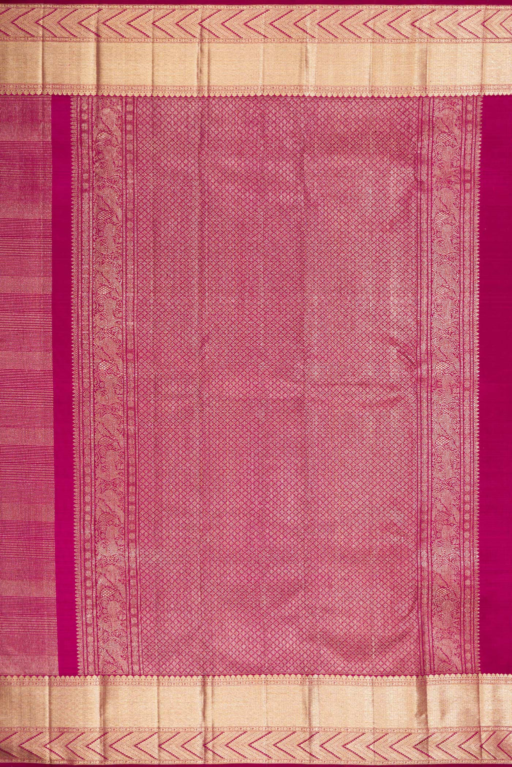 Close up image of the pallu of Magenta Kanchipuram Silk Saree with Zari Brocade on the body and Zari Border. 