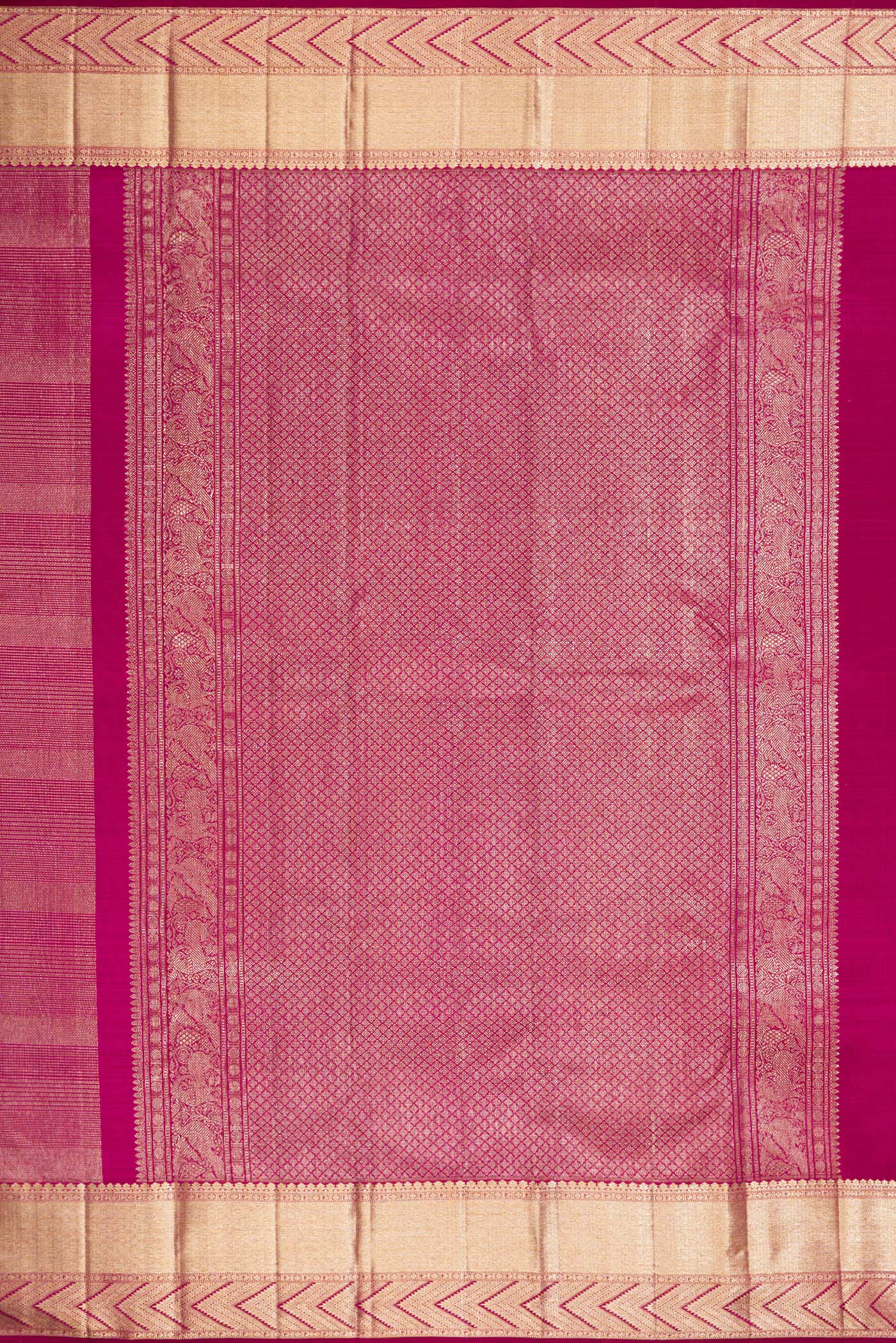 Close up image of the pallu of Magenta Kanchipuram Silk Saree with Zari Brocade on the body and Zari Border. 
