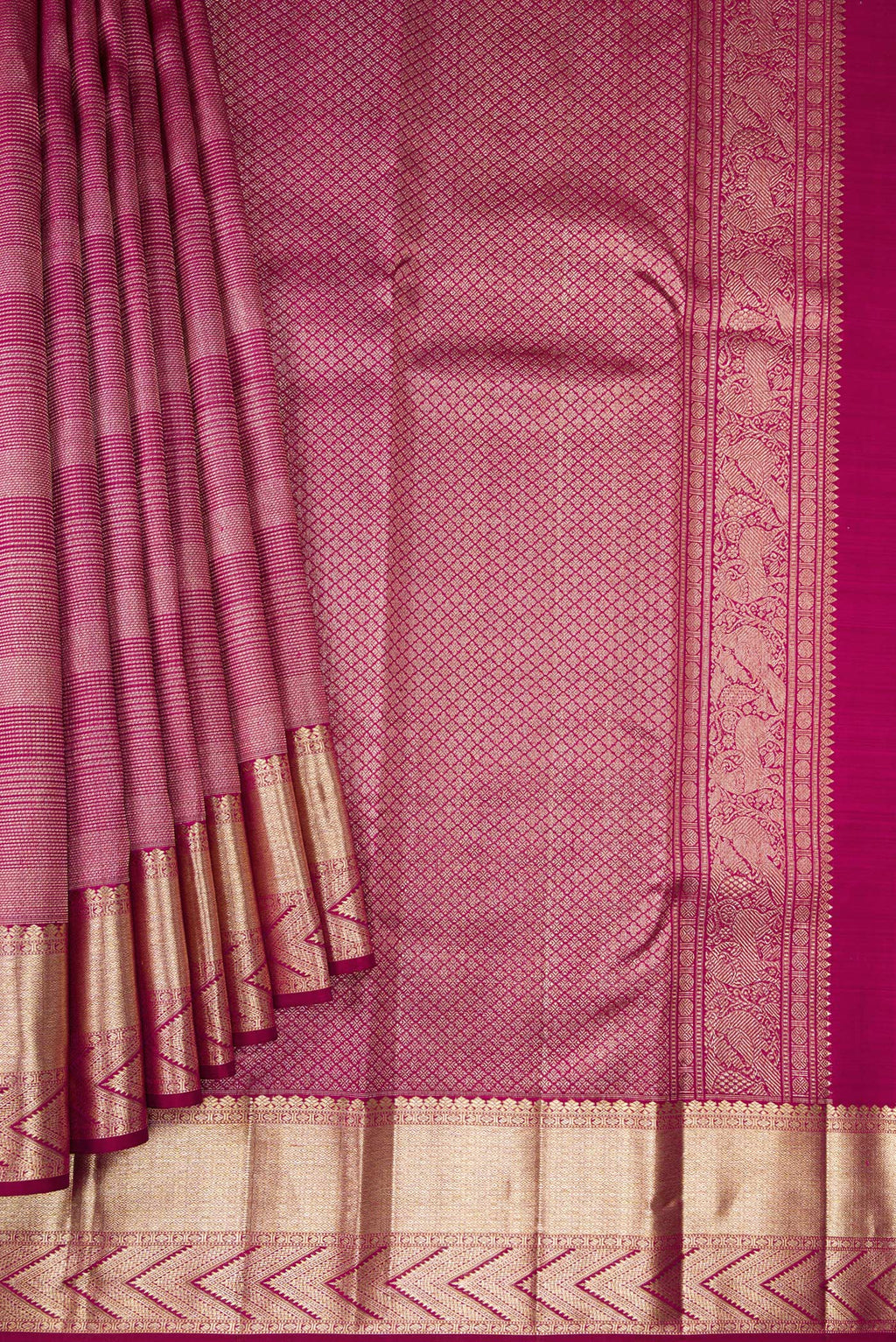 Pleats and pallu of Magenta Kanchipuram Silk Saree with Zari Brocade on the body and Zari Border. 