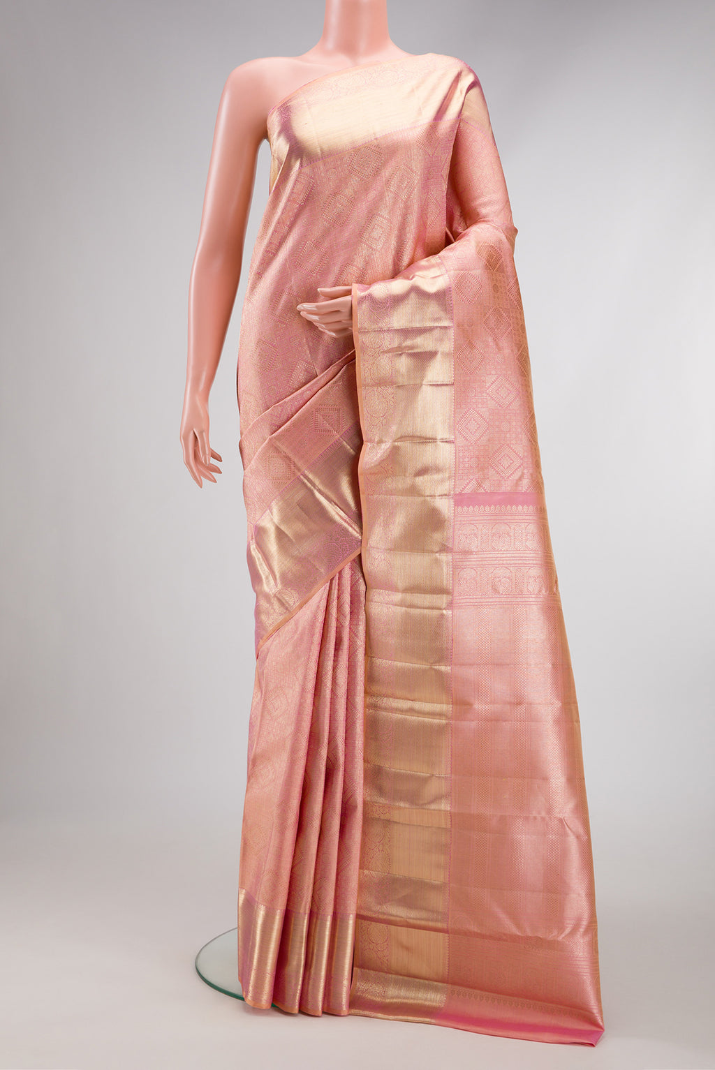 Rose pink Dual Tone Kanchipuram Silk Saree with Zari Brocade on the body and Zari Border.  displayed on a mannequin