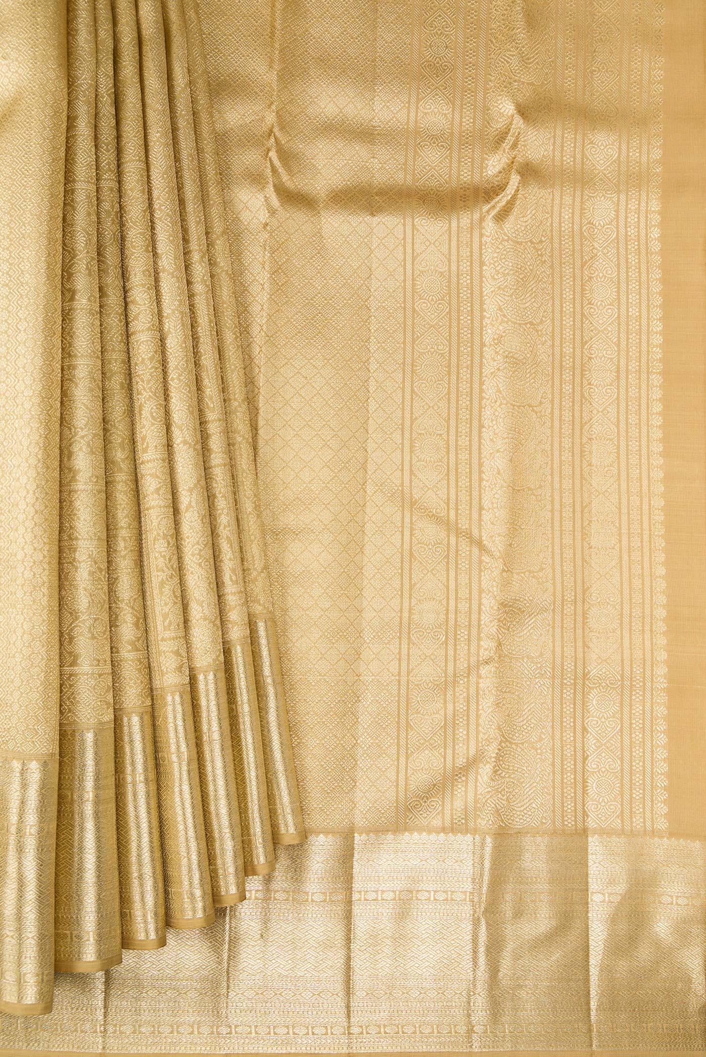 Pleats and pallu of Dark Beige Dual Tone Kanchipuram Silk Saree with Zari Brocade on the body and Zari Border. 